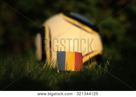 Flag Of Romania On Wooden Stick At Sunset. World Championship 2022. Euro 2020. Classic And Casual So