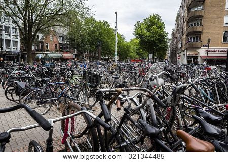 Amsterdam, Holland - July 1, 2017: Amsterdam Is One Of The Most Well Known Bicycle Friendly Cities W