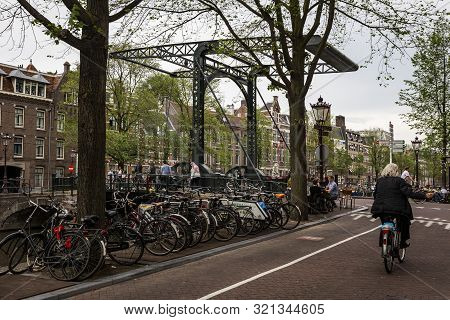 Amsterdam, Holland - July 1, 2017: Amsterdam Is One Of The Most Well Known Bicycle Friendly Cities W