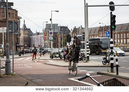 Amsterdam, Holland - July 1, 2017: Amsterdam Is One Of The Most Well Known Bicycle Friendly Cities W