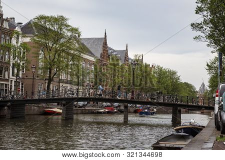 Amsterdam, Holland - July 1, 2017: Amsterdam Is One Of The Most Well Known Bicycle Friendly Cities W