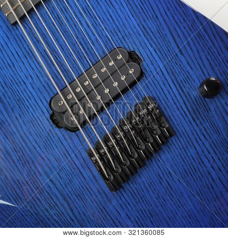 Musical Instrument - Fragment 8-string Blue Electric Guitar Solid-body On A White Background