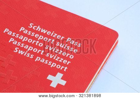 Caslano, Ticino, Switzerland - 2nd August 2019 - Close Up View Of One Swiss Passport On A White Back