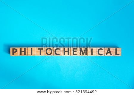 Phytochemical Inscription Wooden Cubes With Letters On A Blue Background