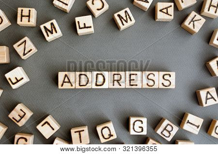 The Word Addres Wooden Cubes With Burnt Letters, Search For A Location Or Postal Address, Gray Backg