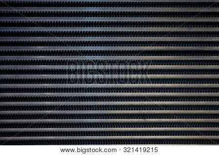 Background Sheet Of Metal Covered With Lines.