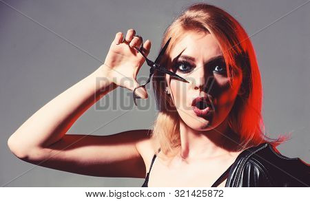 Haidresser Salon. Professional Hairdresser With Scissors. Hair Cutting Tool. Sexy Woman With Fashion