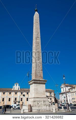 Rome, Italy - April, 2018: Tourists Visiting The Lateran Obelisk An Ancient Egyptian Obelisk Built O