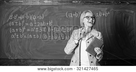 Teacher Smart Woman With Book Explain Topic Near Chalkboard. What Makes Great Teacher. School Teache