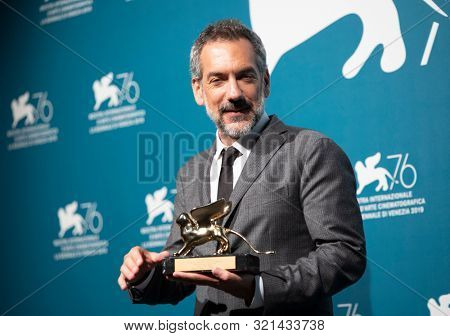 Todd Phillips poses with the Golden Lion for Best Film Award for Ã¢â¬ËJokerÃ¢â¬â¢ at the Winners Photocall during the 76th Venice Film Festival at Sala Grande on September 07, 2019 in Venice, Italy.
