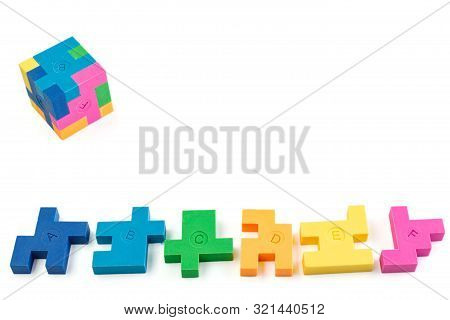 Cube Puzzle Of Multi-colored Rubber Shapes. Concept Of Decision Making Process, Creative, Logical Th