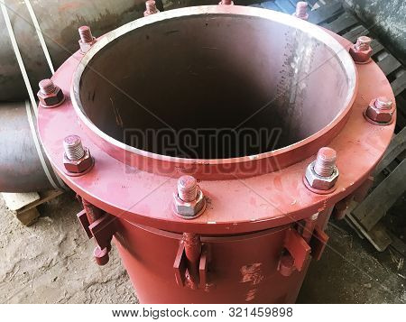 Red Gland Expansion Joints For Heating Main.