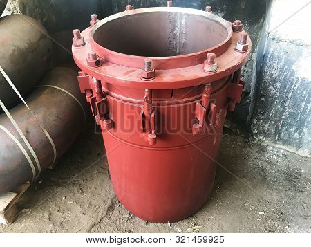 Red Gland Expansion Joints For Heating Main.