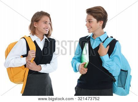 Happy Pupils In School Uniform On White Background