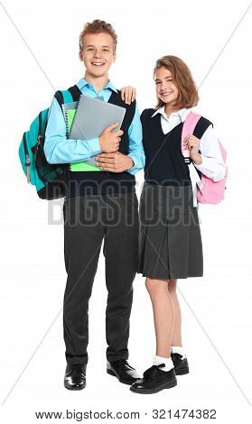 Happy Pupils In School Uniform On White Background