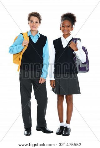 Happy Pupils In School Uniform On White Background