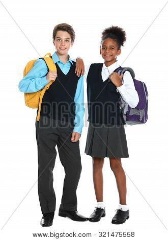 Happy Pupils In School Uniform On White Background