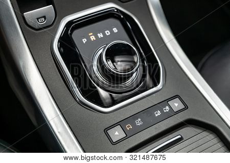 Novosibirsk, Russia - August 24, 2019:  Land Rover Range Rover Evoque,  Hand On The Gear Shift. Auto