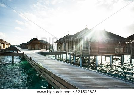 Water Villas In The Maldives In The Sun