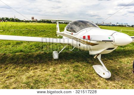 KALININGRAD, Russia - August 18, 2019: 100 Anniversary First European Airport Devau Fest, Ultra Light Propeller Screw Plane Ready for Flight