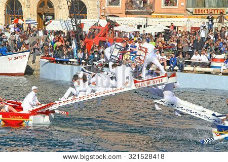 Sete, France - March 26, 2016: Water Jousting Performance During Stopover In Sète - Maritime Traditi