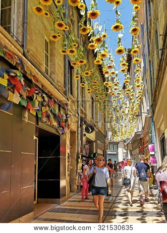 Avignon, France 28 Juillet 2019: Plenty Of Sunflowers Against A Bleu Sky During Famous Theatre Festi