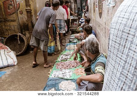 Birbhum District, Bolpur, Shantiniketan, West Bengal, India 1 May 2018 - The Village People Selling 