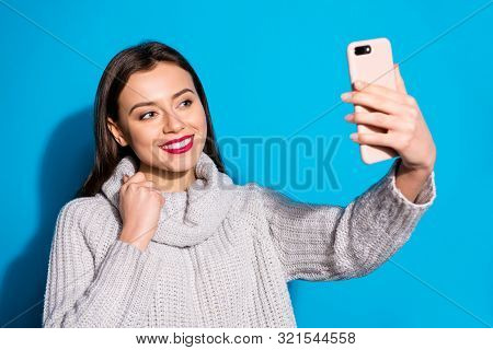 Pretty Lady Holding Telephone Hands Making Selfies Wear Warm Knitted Pullover Isolated Blue Backgrou