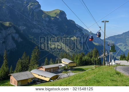 Cableway At Melchtal On The Swiss Alps