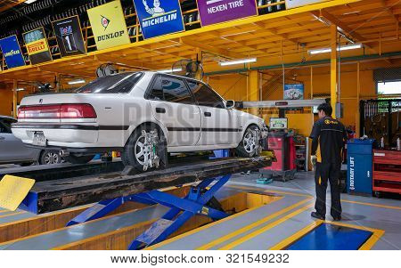 Bangkok, Thailand - September 01: B-quik Auto Mechanic Shop At Bigc Petchkasem Performs Wheel Alignm