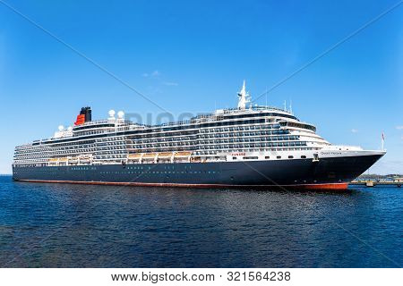 Tallinn / Estonia - May 05, 2019: Cruise Ship Queen Victoria Of The Cunard Ship Fleet Docked In Vana