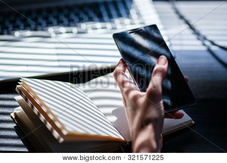 woman hands using smartphone, home office background, social media  influencer