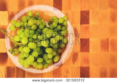Green Grape On The Wooden Cutting Board