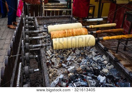 Preparation Of The Famous, Traditional And Delicious Hungarian Chimney Cake Kurtos Kolacs (kürtőskal
