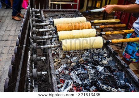 Preparation Of The Famous, Traditional And Delicious Hungarian Chimney Cake Kurtos Kolacs (kürtőskal