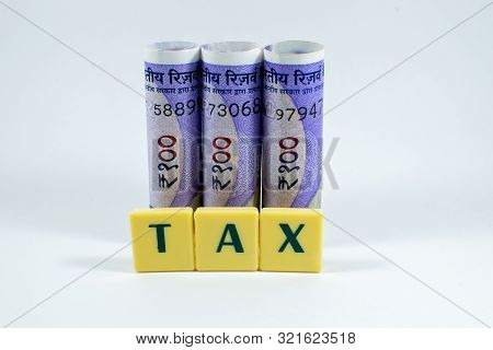 Tax Word Concept Light Background Image Using By Block Letter For Various Purposes Of Tax Related Wo
