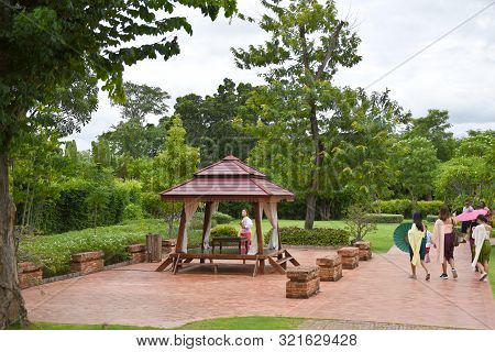 Kanchanaburi, Thailand, 09.09.2019: Beautiful Garden, Lake, Traditional Thai, Siamese Clothes, Build