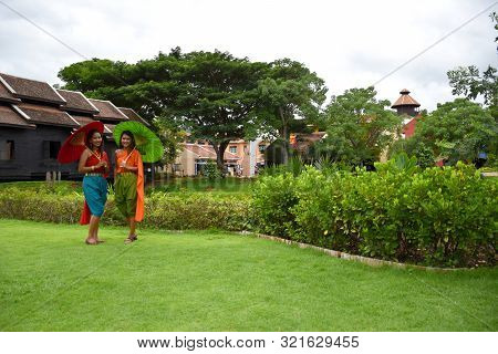 Kanchanaburi, Thailand, 09.09.2019: Beautiful Garden, Lake, Traditional Thai, Siamese Clothes, Build