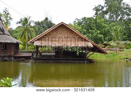 Kanchanaburi, Thailand, 09.09.2019: Beautiful Garden, Lake, Traditional Thai, Siamese Clothes, Build