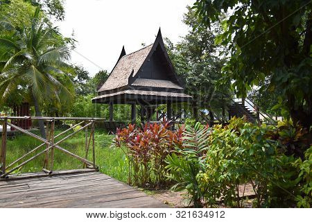 Kanchanaburi, Thailand, 09.09.2019: Beautiful Garden, Lake, Traditional Thai, Siamese Clothes, Build