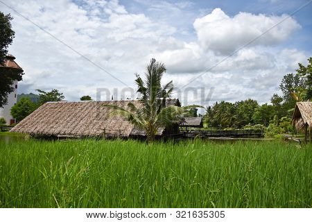 Kanchanaburi, Thailand, 09.09.2019: Beautiful Garden, Lake, Traditional Thai, Siamese Clothes, Build