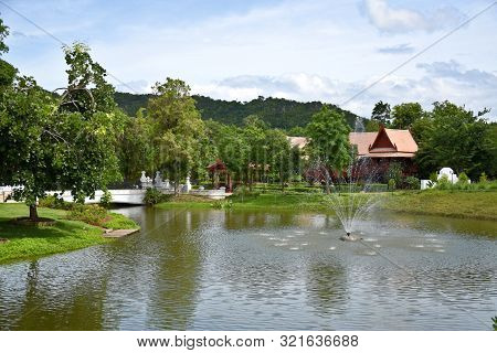 Kanchanaburi, Thailand, 09.09.2019: Beautiful Garden, Lake, Traditional Thai, Siamese Clothes, Build