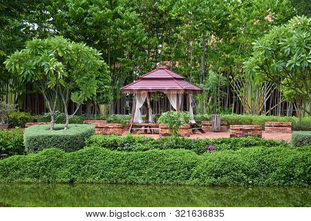 Kanchanaburi, Thailand, 09.09.2019: Beautiful Garden, Lake, Traditional Thai, Siamese Clothes, Build
