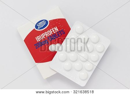 London / Uk - September 7th 2019 - Packet Of Ibuprofen Painkillers, Closeup With Blister Pack Of Tab