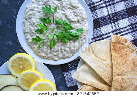 Famous Traditional Arabic Cousine - Dip Baba Ganoush With Pita Bread And Fresh Lemon. Flat Lay, Top 