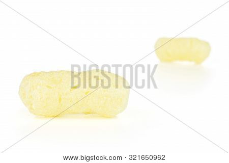 Group Of Two Whole Salted Yellow Corn Puff Isolated On White Background