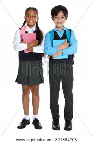 Happy Children In School Uniform On White Background