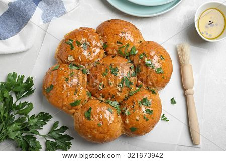 Traditional Ukrainian Garlic Bread (pampushky) On Light Marble Table, Flat Lay