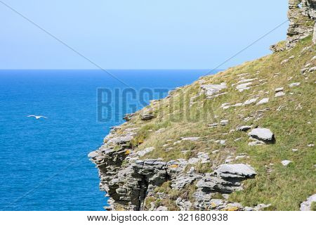 A photography of a rough coast in cornwall