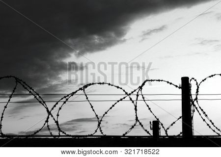 Barbed Wire Fence Prison Dark Sky Background